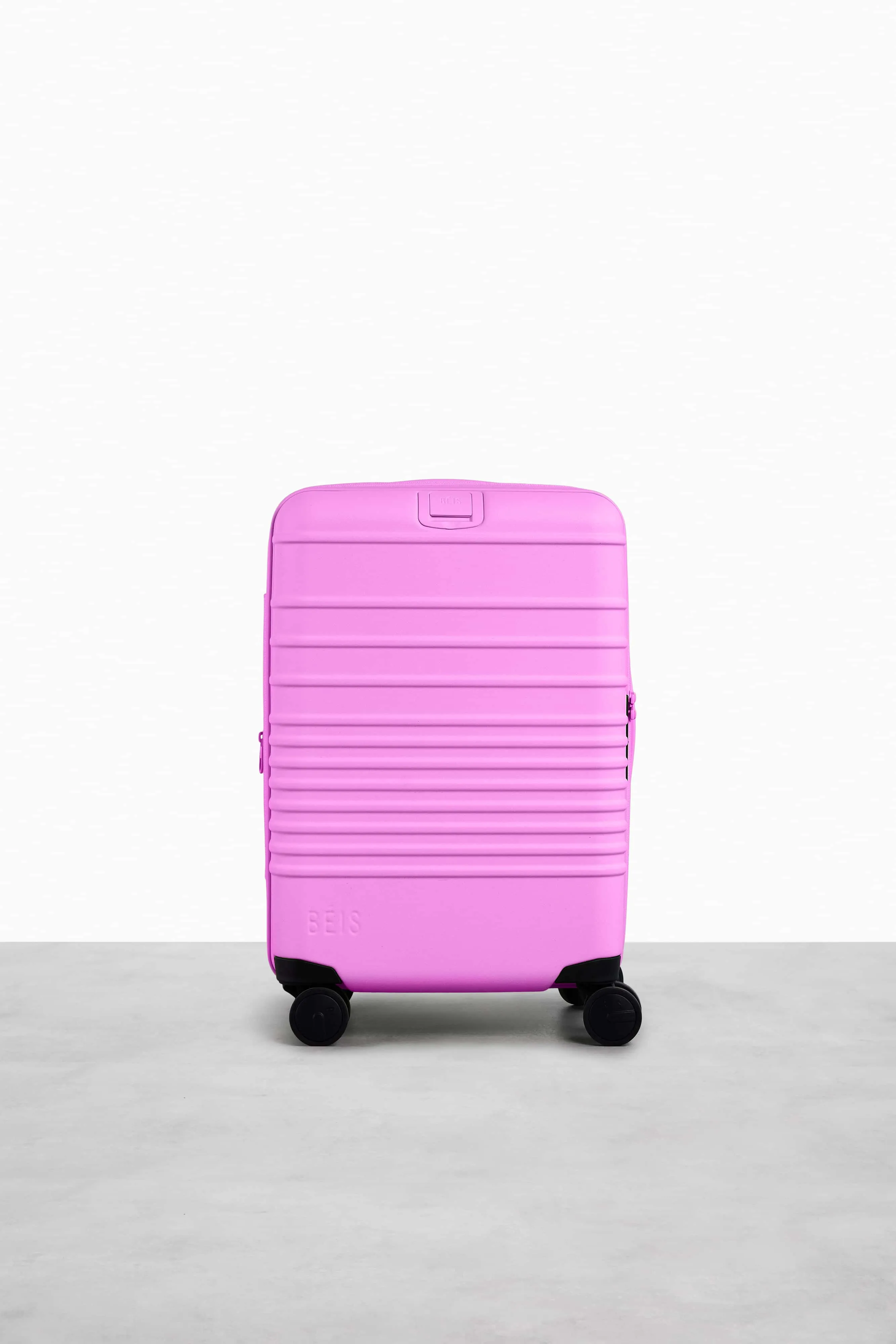 The Carry-On Roller in Berry