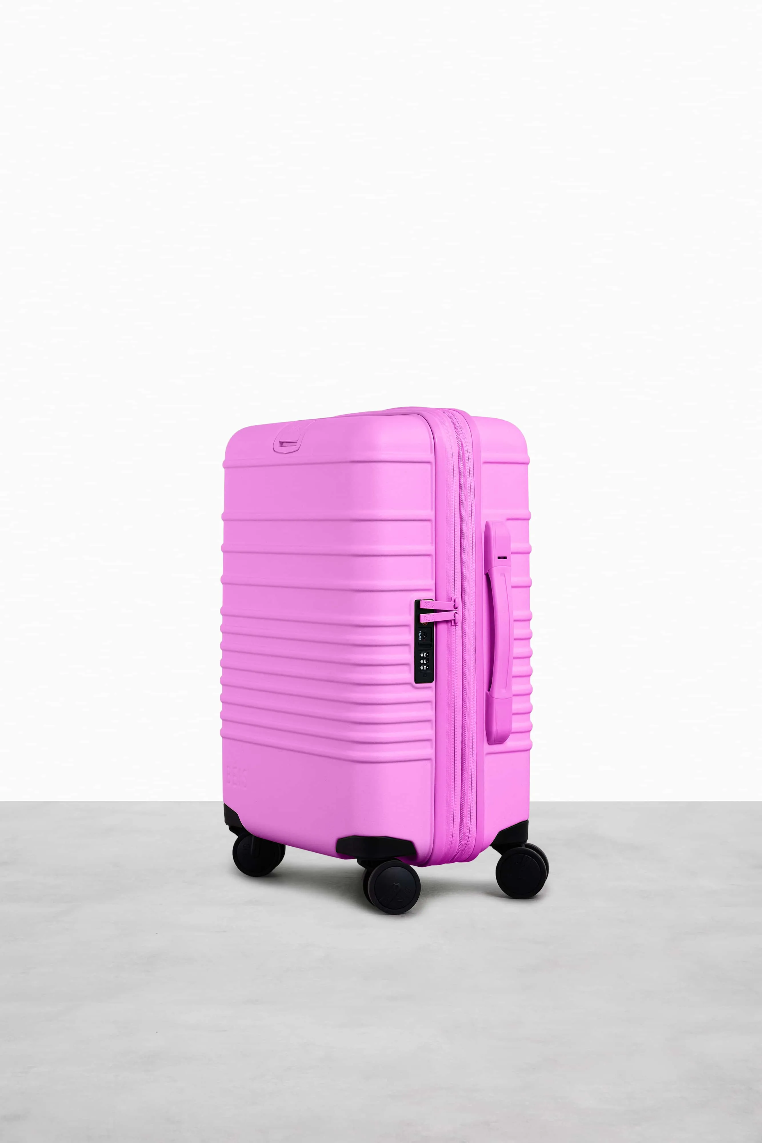 The Carry-On Roller in Berry